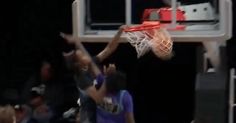 Jasper Johnson throws down poster dunk during Overtime Elite game